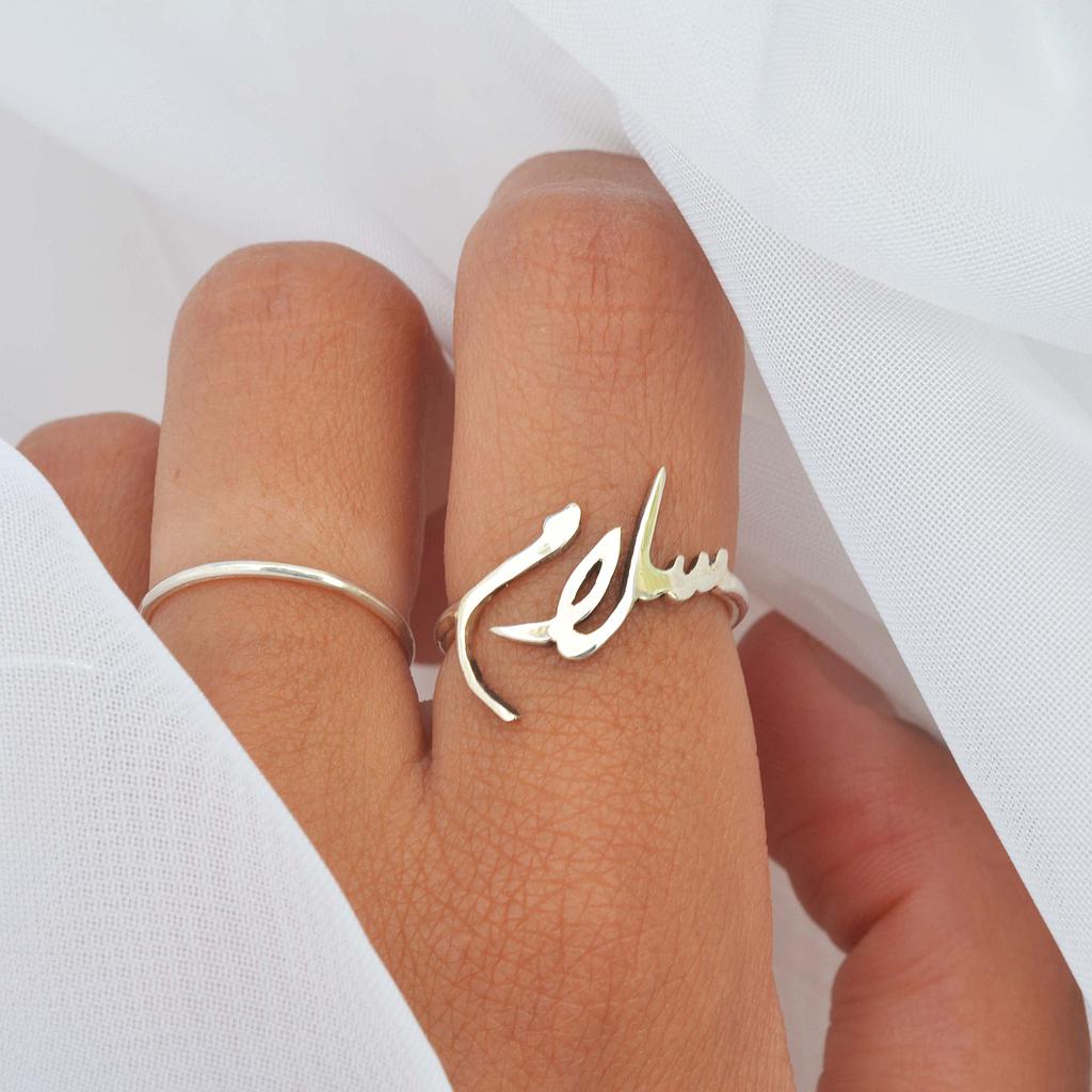 BAGUE " PAIX " EN ARGENT
